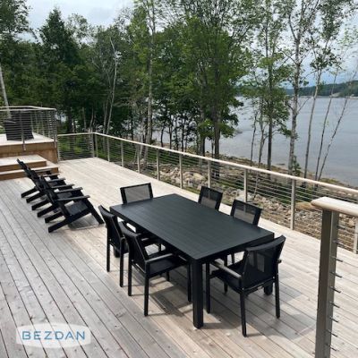 Exterior cable railing with CR1650 and CR1651 fascia mount posts, CR1690 brackets, and CR1600 cable along a lakeside deck.