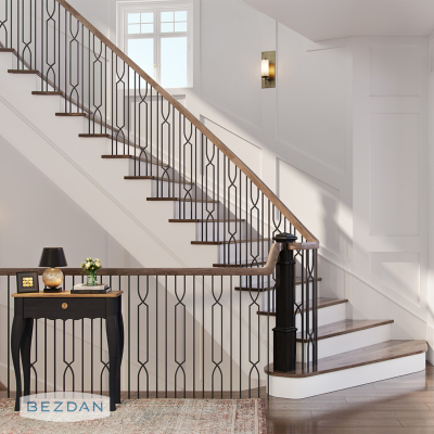 Elegant staircase with TimeLine TL77-1-30 geometric steel balusters and wood railing in a bright transitional home interior.