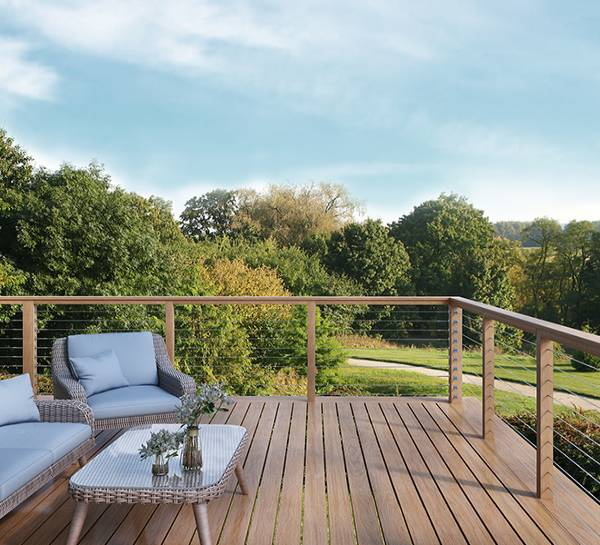 Balcony in Oregon featuring cable deck railing