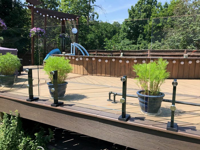 Aluminum mini-post Surface mounted aluminium mini-post were an ideal solution for this deck with overhang.
