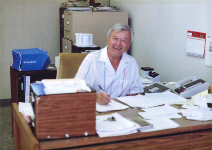 Our founder - George Bezdan Hard at work. George Bezdan at one of his first offices.