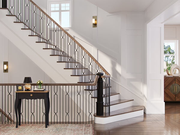 A contemporary straight staircase featuring geometric steel tube balusters with dowel top