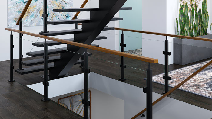 Modern interior staircase featuring a black stainless steel stair railing with frameless glass panels, black PVD-finished stainless steel posts and clamps, and a warm wood handrail, showcasing a sleek black stainless steel railing design for contemporary homes.